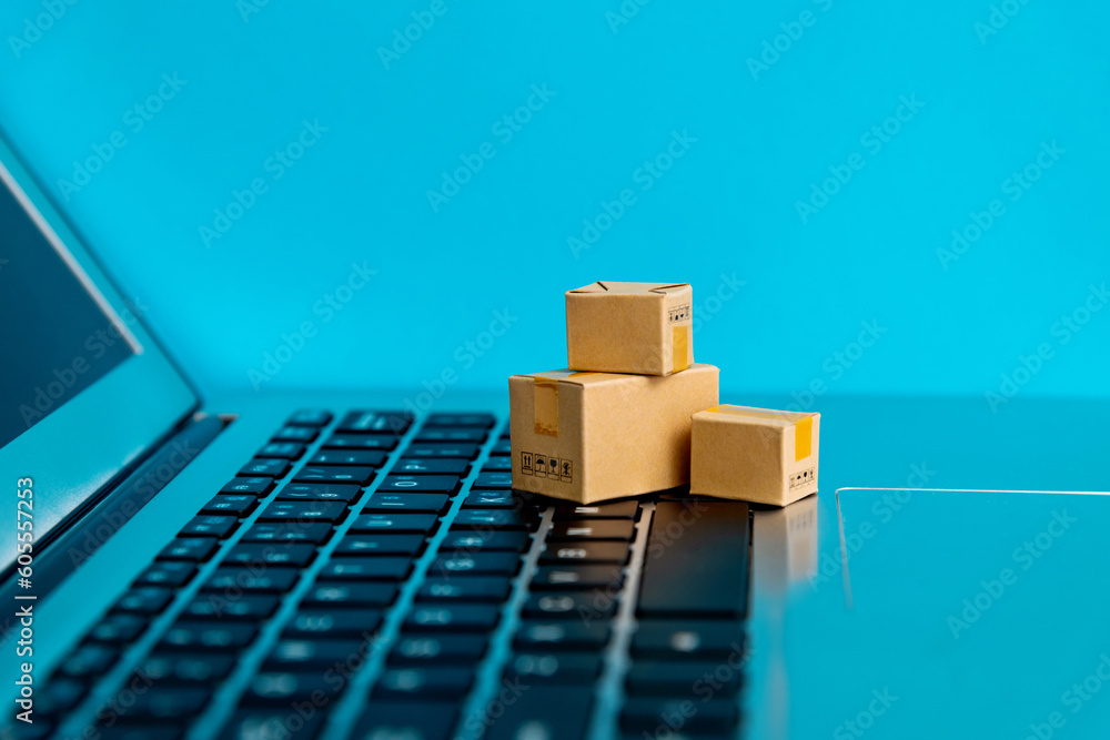 Small cartons on laptop keyboard