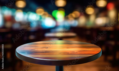 Empty wood table top of round on blur restaurant background, product display montage