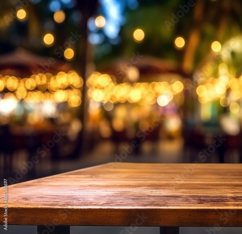 Empty wooden table and Coffee shop blur background with bokeh lights. High quality photo