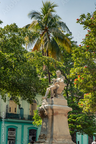 Statue of Miguel De Cervantes Saavedra in Cervantes Square in Havana, Cuba photo
