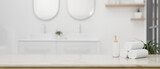 Empty space on a luxury white tabletop in a luxury white bathroom with double sink