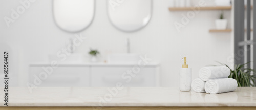 Foto Empty space on a luxury white tabletop in a luxury white bathroom with double si