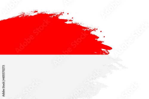 Indonesia flag on a stained stroke brush painted isolated white background with copy space