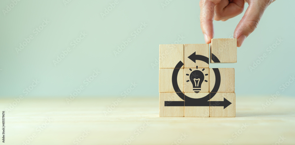 Creative idea, solution and innovation concept. Idea generation for business development. Wooden cube blocks with light bulb and cycle icons on clean background and copy space. - obrazy, fototapety, plakaty 
