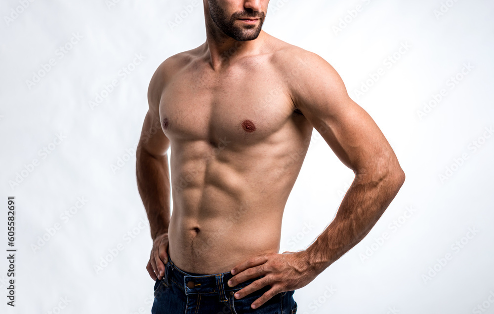 Fit and handsome man with beautiful torso. Strong and handsome ,fit and sporty bodybuilder man.  Man Fitness Model Torso showing six pack abs