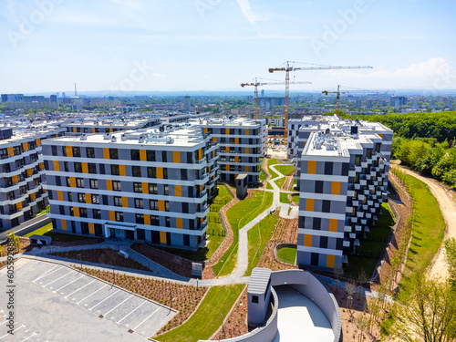 Aerial view landscape Poland Cracow. View of modern estate and blocks of apartments, new apartments.  © karolinaklink