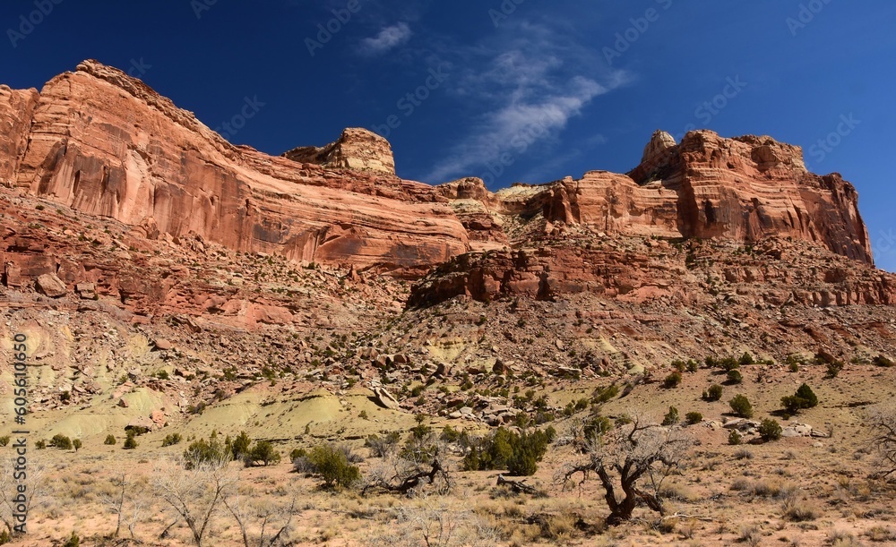 dramatic red rock formations on a sunny winter day in the san rafael river canyon along the buckhorn draw scenic byway in the northern san rafael swell near green river, utah dramatic red rock formations on a sunny winter day in the san rafael river canyon along the buckhorn draw scenic byway in the northern san rafael swell near green river, utah