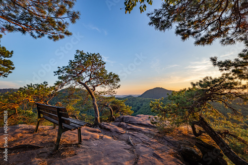 Bench on Rock Slevogtfelsen with View of Palatinate Forest during Sunset, Rhineland-Palatinate, Germany, Europe