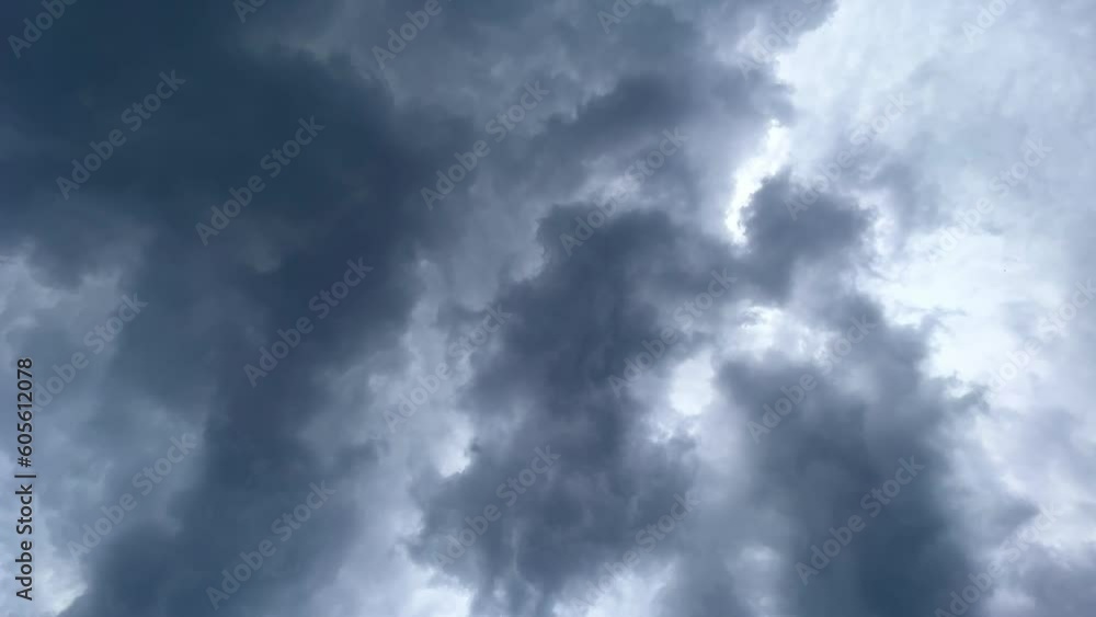 Dramatic time-lapse of moving white clouds in stormy sky. Timelapse of dynamic cloudscape in dramatic sky, vertical video Dramatic time-lapse of moving white clouds in stormy sky. Timelapse of dynamic cloudscape in dramatic sky, vertical video