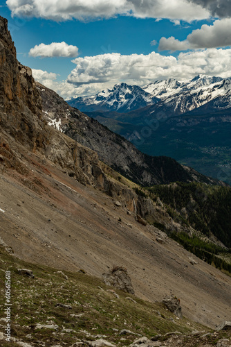 Hiking in the Ecrins massif under the Cime de la Condamine in the French Alps