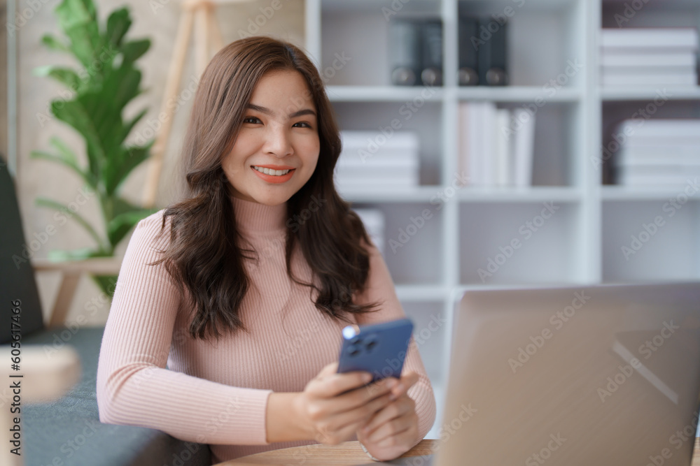 Home lifestyle woman relaxing sleeping on sofa patio living room. Happy lady sitting on comfortable sofa using smartphone mobile while select listen music Tropical vacation. Home lifestyle woman relaxing sleeping on sofa patio living room. Happy lady sitting on comfortable sofa using smartphone mobile while select listen music Tropical vacation.