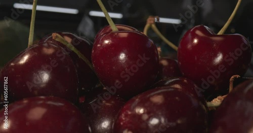 plums in wooden box and with laowa optics in moving close-up