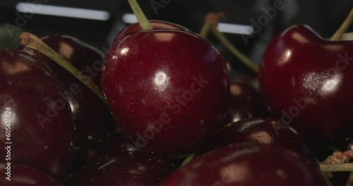 plums in wooden box and with laowa optics in moving close-up