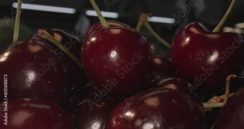 plums in wooden box and with laowa optics in moving close-up