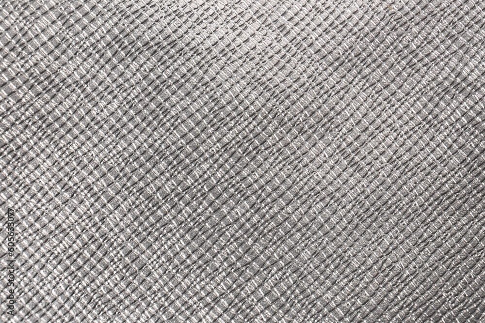 Closeup view of silver fabric as background Closeup view of silver fabric as background