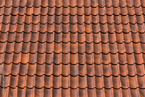 Red tiles roof background