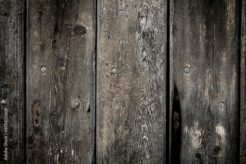 wooden background with weathered wood and ruusty nails
