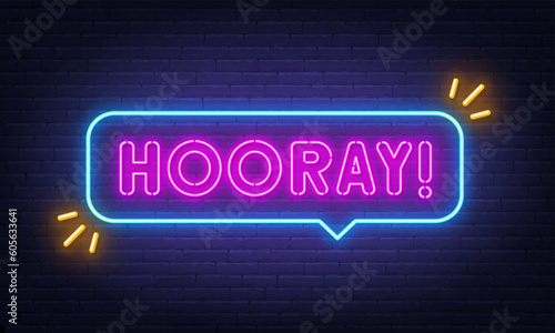Hooray neon sign in the speech bubble on brick wall background.