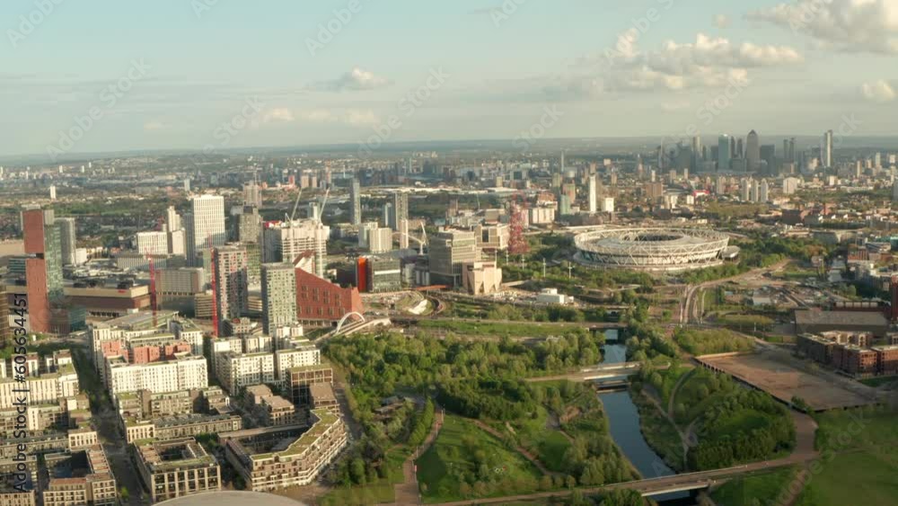 Dolly back aerial shot over Olympic park and Stratford east London Dolly back aerial shot over Olympic park and Stratford east London
