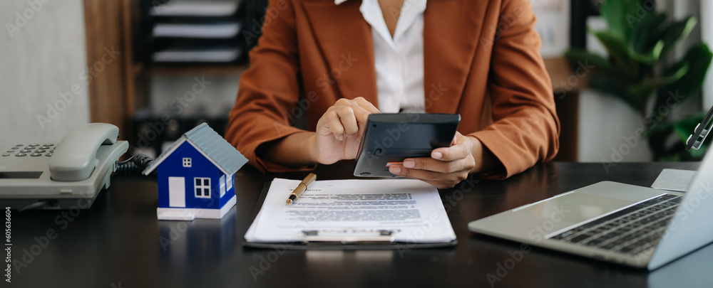 Considering buying a home, investing in real estate. Broker signs a sales agreement. agent, lease agreement, successful deal . Considering buying a home, investing in real estate. Broker signs a sales agreement. agent, lease agreement, successful deal .