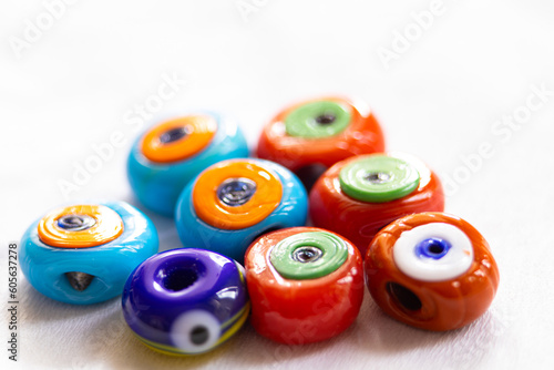 Bright multicolored beads with a sign from the evil eye