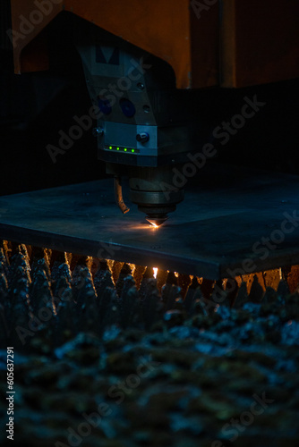 Fire sparks during the operation of the cnc machine in the factory
