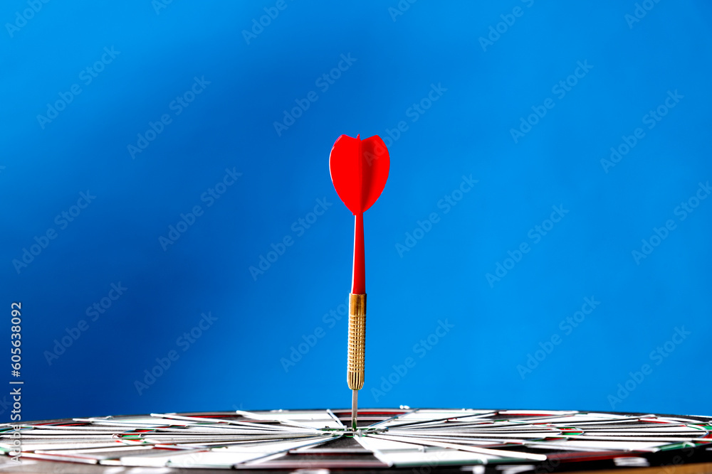 Dart hitting on center target Dart hitting on center target