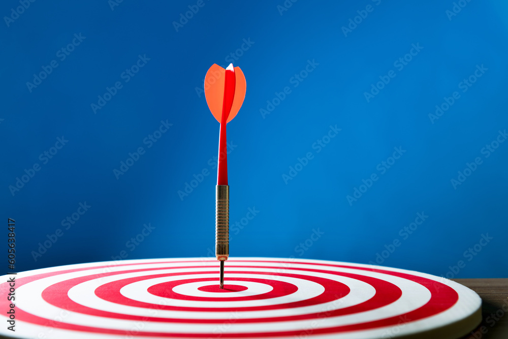 Dart hitting on center target Dart hitting on center target