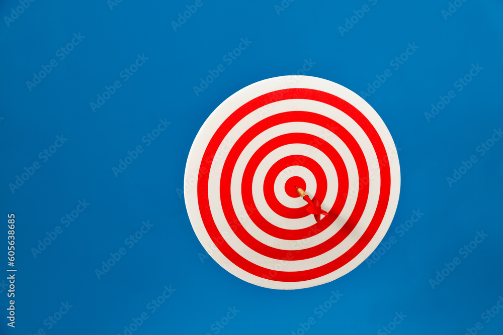 Dart hitting on center target Dart hitting on center target