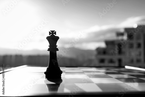 King chess piece on city background