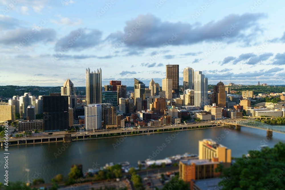 Bird's-eye view of buildings and bridges of a city by a river