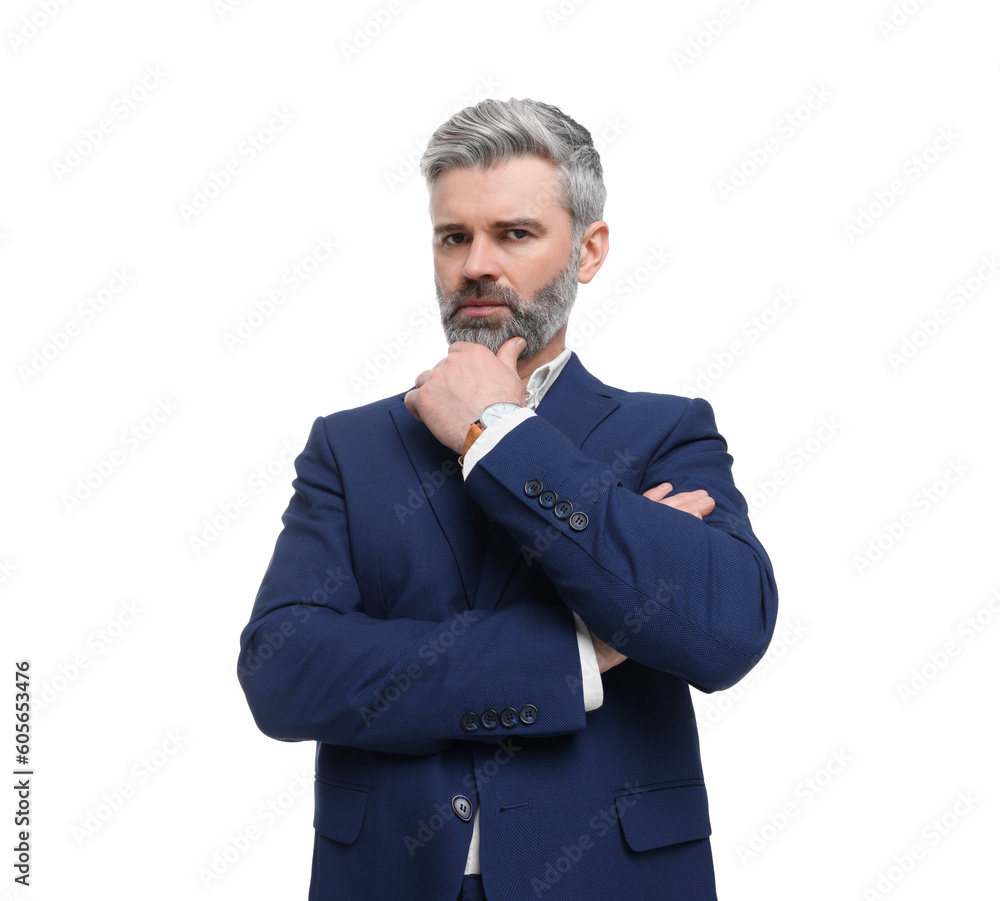 Mature businessman in stylish clothes posing on white background, low angle view Mature businessman in stylish clothes posing on white background, low angle view
