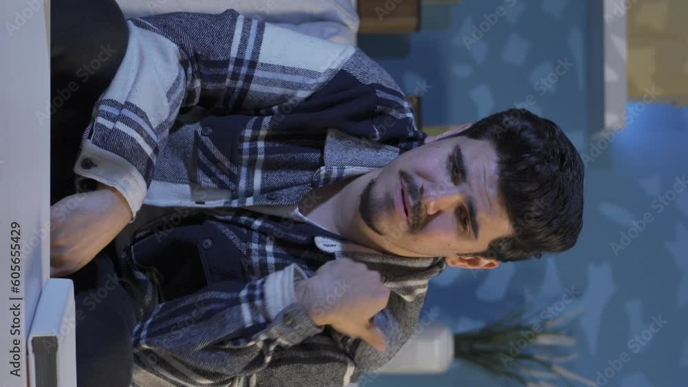 Vertical Video of The young man who broke up with his loved one blames himself and drinks alcohol. Vertical Video of The young man who broke up with his loved one blames himself and drinks alcohol.