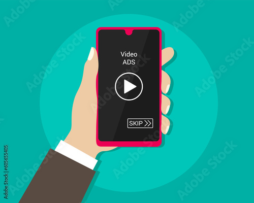 Editable design of a holding a phone with a video advertisement on the screen with a skip button