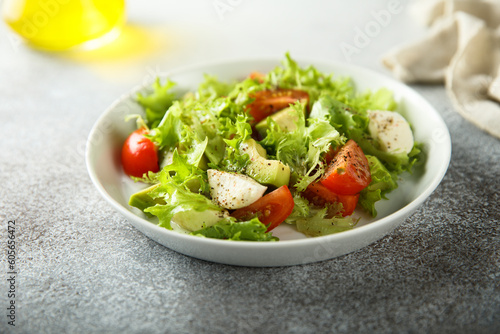 Healthy avocado salad with mozzarella cheese