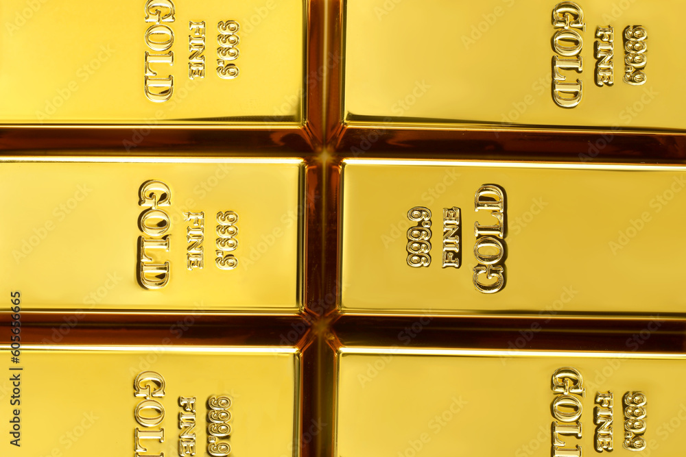 Many shiny gold bars as background, top view Many shiny gold bars as background, top view
