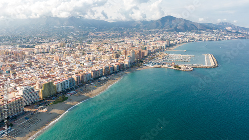 Fuengirola Spain, Aerial view on Coast of sea and buildings. Drone photo of coastal town photo