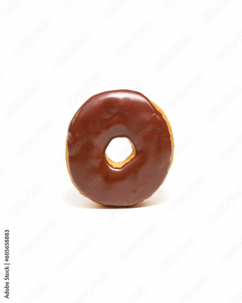 Creamy chocolate donut isolated on a white background Creamy chocolate donut isolated on a white background