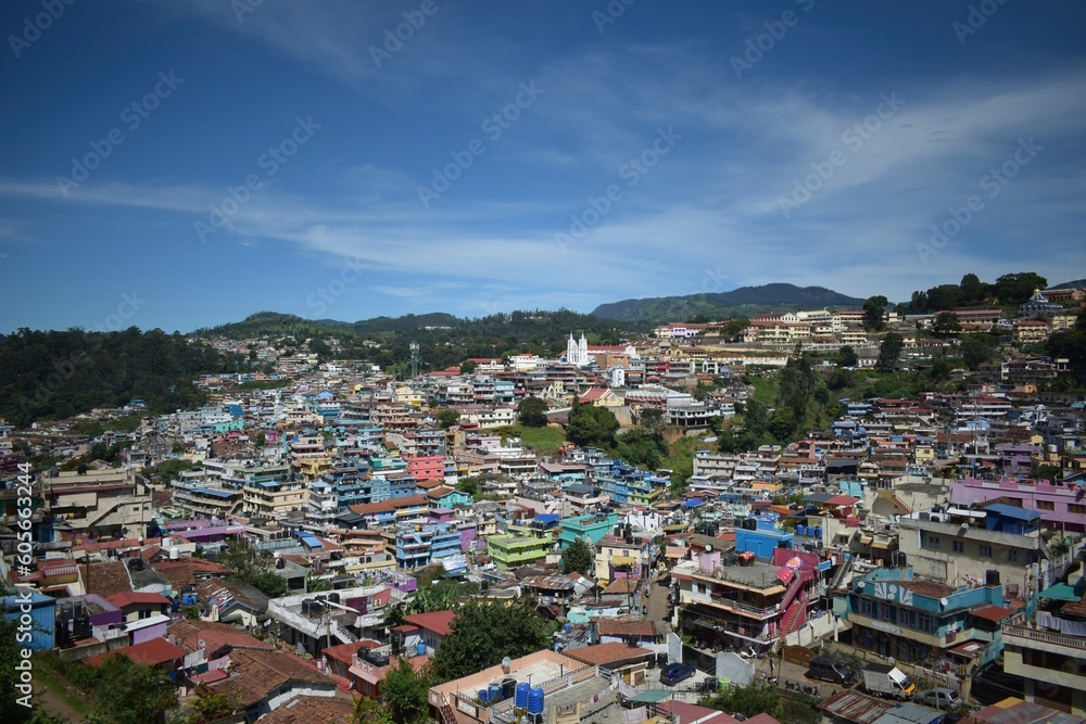 View of Coonoor town under the blue sky, India
