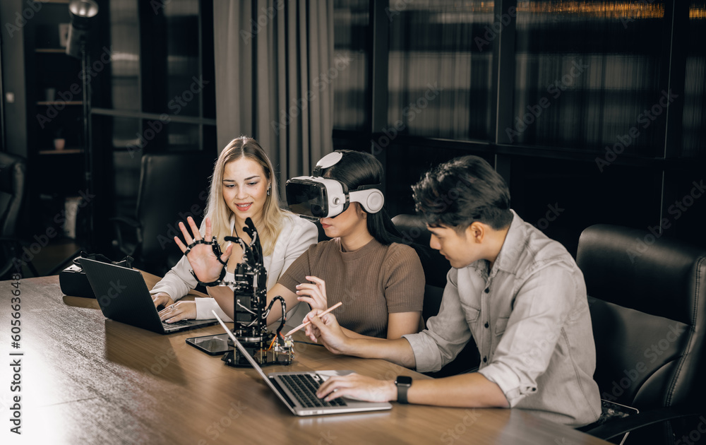 College students collaborate with research team to do experiment with educational robots. Wearing virtual reality goggle help learner to engage real, interacting situations with immersive experience. College students collaborate with research team to do experiment with educational robots. Wearing virtual reality goggle help learner to engage real, interacting situations with immersive experience.