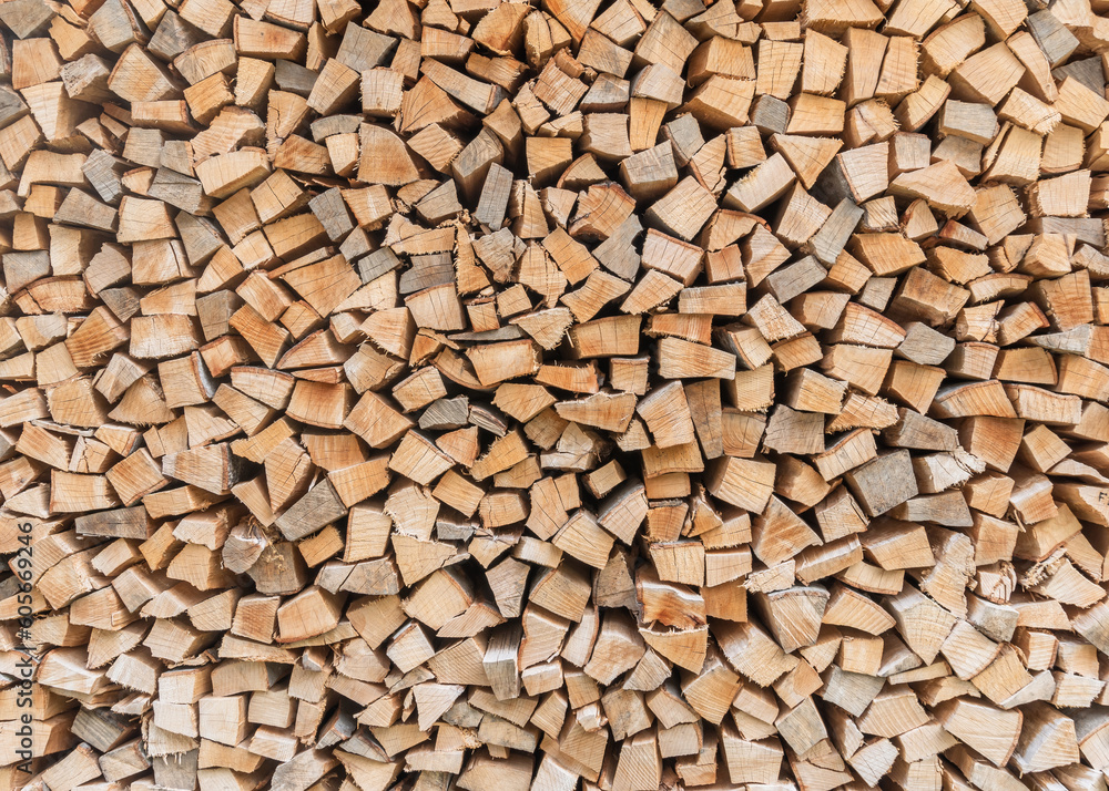 Firewood stack background of woodpile pattern cut from tree wood log with natural texture for fireplace in winter Firewood stack background of woodpile pattern cut from tree wood log with natural texture for fireplace in winter
