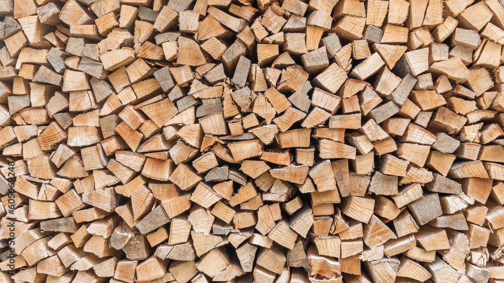 Firewood stack background of woodpile pattern cut from tree wood log with natural texture for fireplace fagot in winter Firewood stack background of woodpile pattern cut from tree wood log with natural texture for fireplace fagot in winter