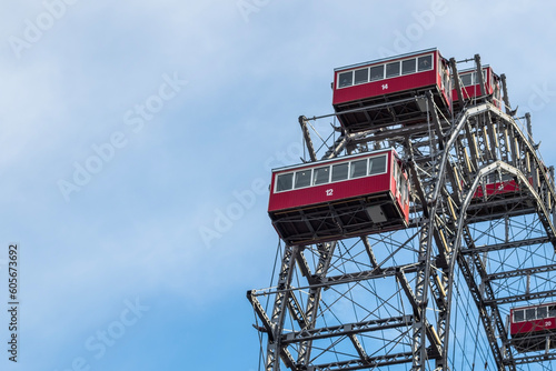 Close up of a ferris wheel in Prater, Vienna with blue sky in the background