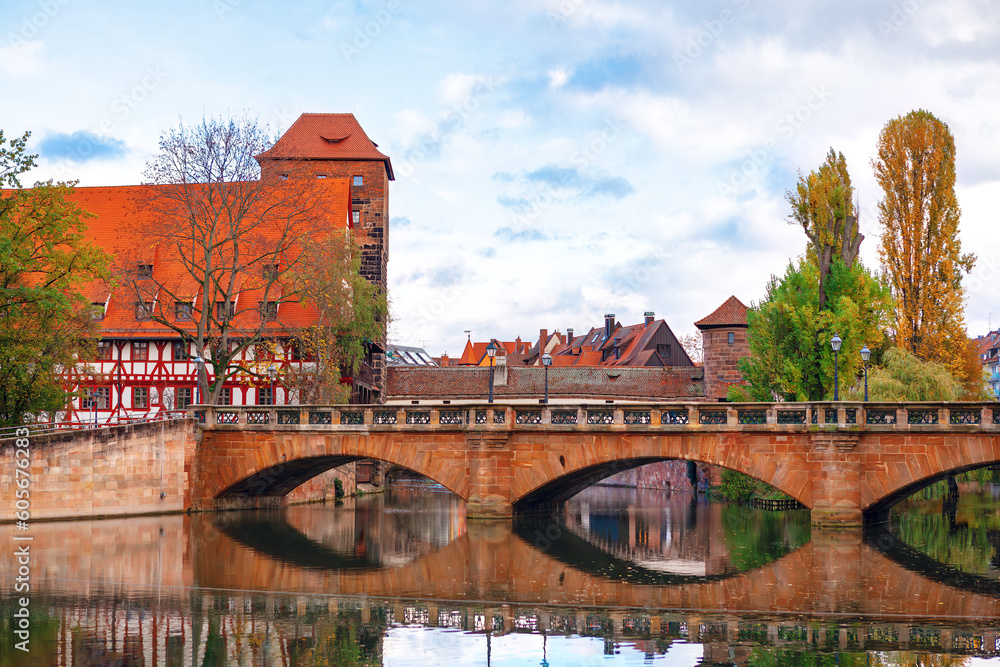 Nuremberg arch bridge over river . German old town in the autumn 