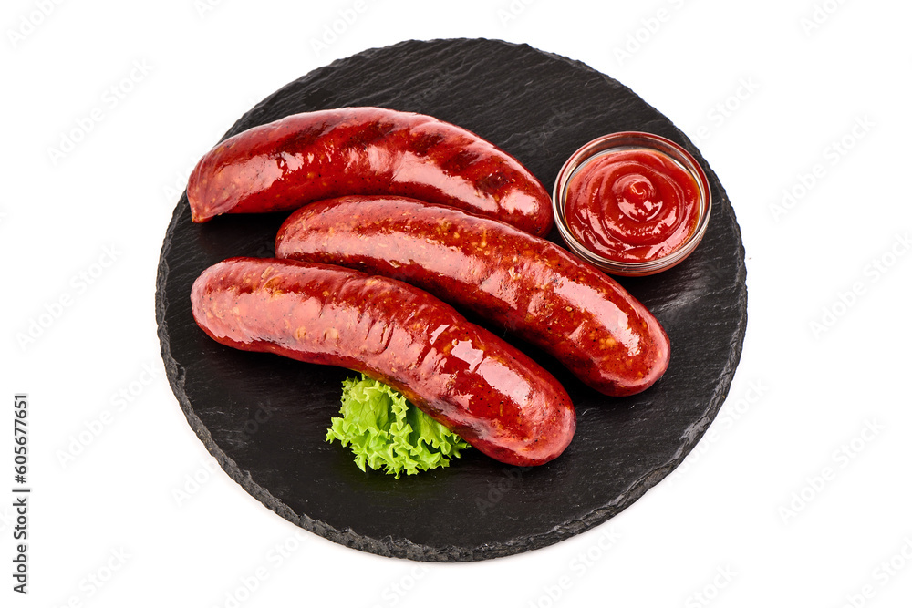 German grilled pork sausages, close-up, isolated on white background. German grilled pork sausages, close-up, isolated on white background.