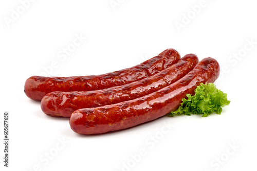 Grilled pork sausages, isolated on white background.