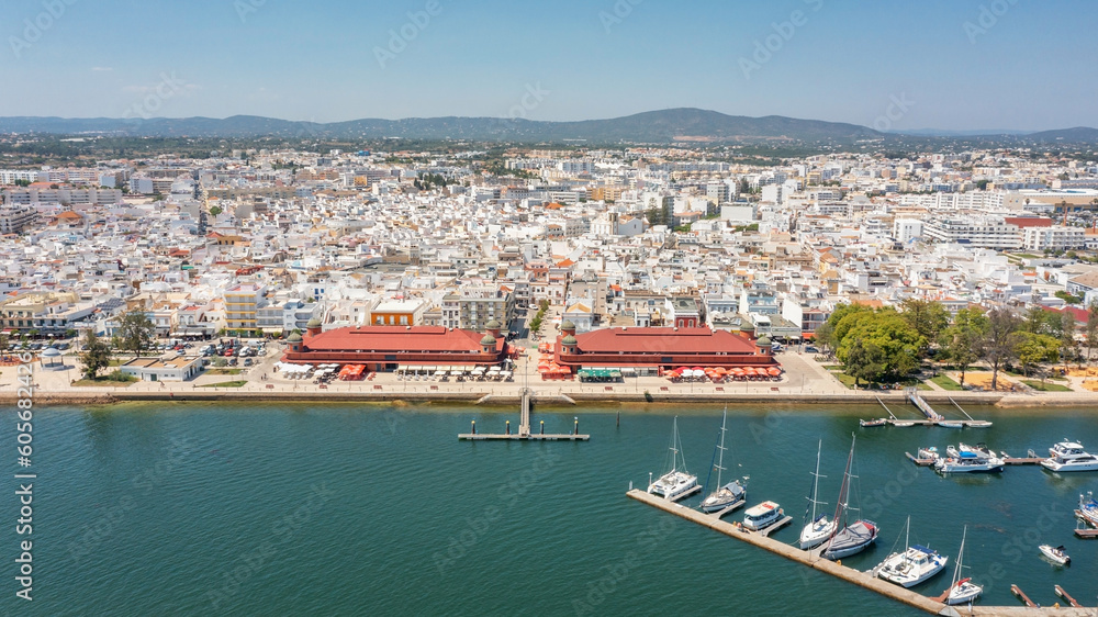 Aerial view of Portuguese fishing town of Olhao with a view the Ria Formosa Marine Park. Sea port 