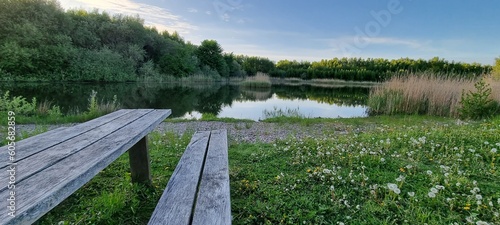 Wooden bench by the lake
