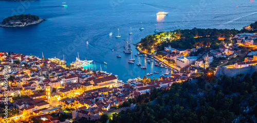 Aerial view of Hvar rooftops and harbor evening panoramic view