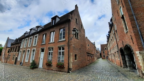 Historical streets with cobble-stones in Groot Begijnhof (Great Beguinage) in Leuven, Belgium. The beguinage dates from the 13th century.
